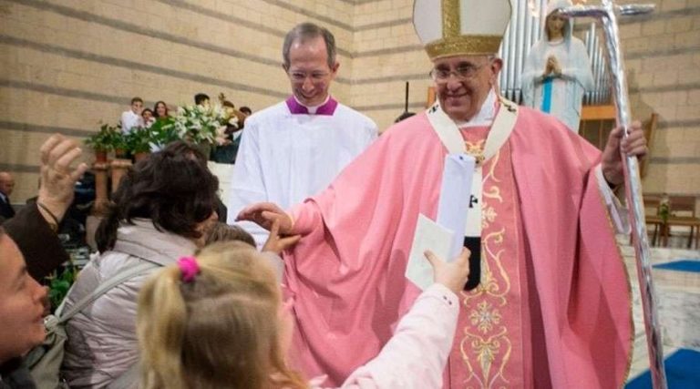 Why do priests wear pink this Sunday of Lent?